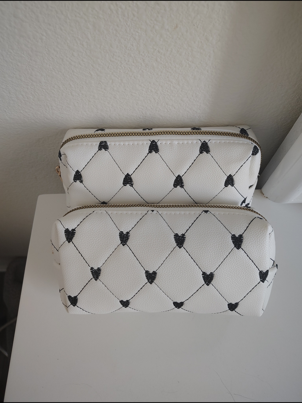 Under One Sky White Faux-Leather Cosmetic Pouch Duo with Black Heart Stitching